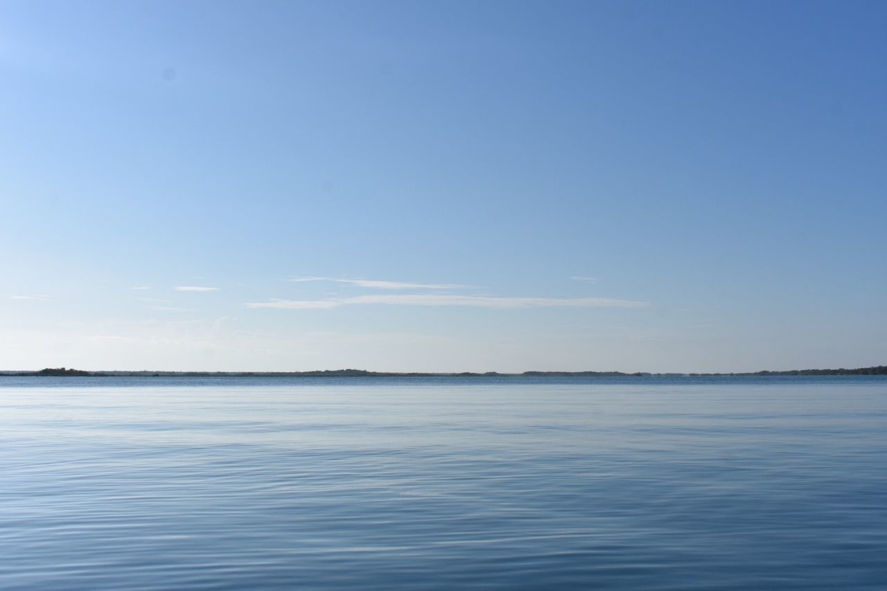 tranquility, sea, scenics, beauty in nature, nature, tranquil scene, water, outdoors, waterfront, blue, idyllic, no people, sky, day, landscape, view into land, clear sky