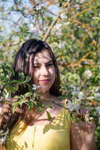 Portrait of young woman looking away