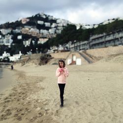 Woman standing on beach