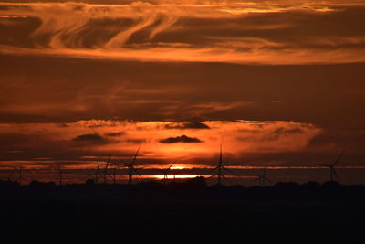 Scenic view of silhouette landscape against sky during sunset