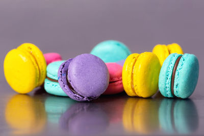 Close-up of multi colored candies on table