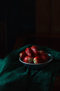 Close-up of strawberries in bowl on table