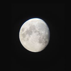 Low angle view of moon against sky at night