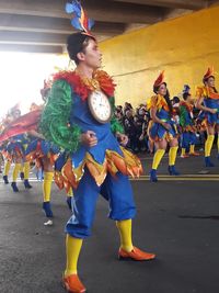 Rear view of people in traditional clothing during festival