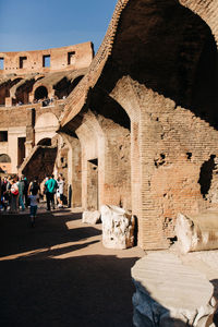 Group of people in front of historical building