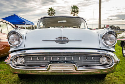 Vintage car against sky