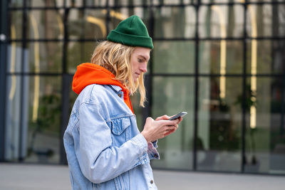 Young woman using mobile phone