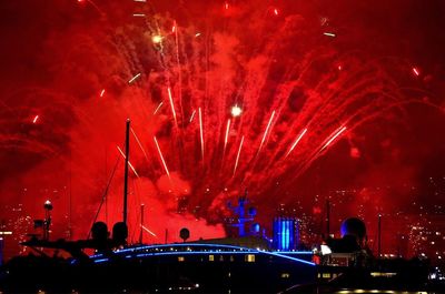Illuminated ferris wheel at night