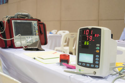 Close-up of monitoring equipment on table