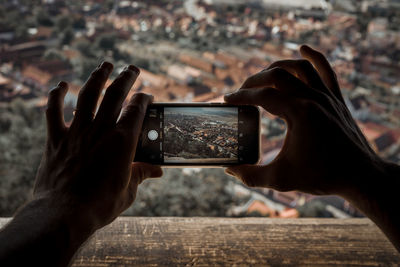 Close-up of hand holding smart phone