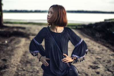 Woman standing on field