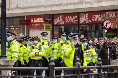 Group of people on street in city