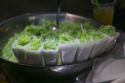 Closeup of pandan sticky rice with coconut milk on the street food in ho chi minh city, vietnam