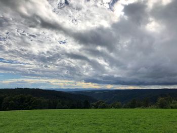 Scenic view of field against sky