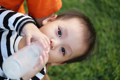 Portrait of cute boy drinking milk