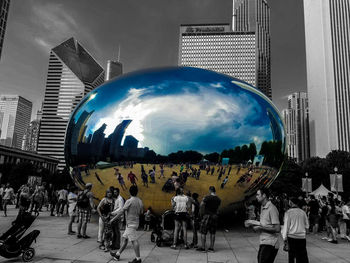 Panoramic view of people in front of buildings