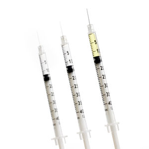 Low angle view of communications tower against white background