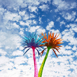 Low angle view of firework display against sky