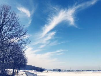 Scenic view of snow field against sky