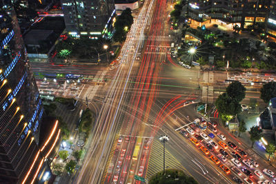 High angle view of light trails on city street