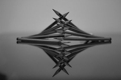 Pencils arranged on glass table