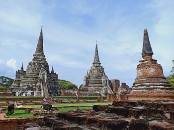 Old temple against building