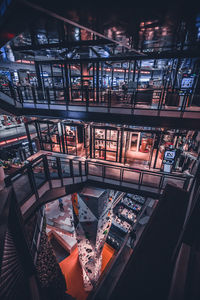 High angle view of illuminated railroad station at night