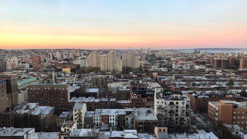 Aerial view of cityscape against clear sky