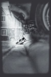 Close-up of car on road