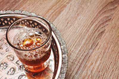 High angle view of coffee served on table