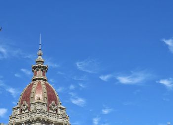 Low angle view of statue of liberty against sky