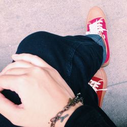 Low section of man standing outdoors