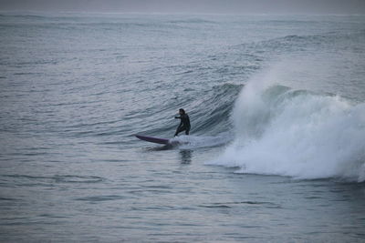Man surfing in ocean 