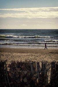 Scenic view of beach and sea against sky