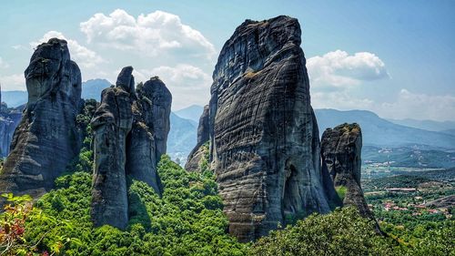 Rock formations and landscape against sky