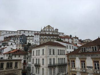 Low angle view of houses against sky