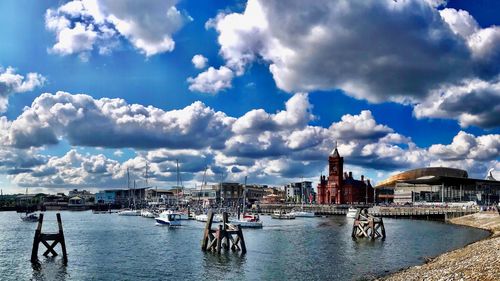 View of buildings against cloudy sky