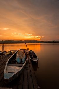 Scenic view of sunset over lake