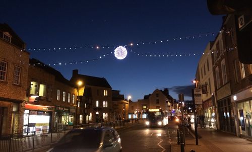 Illuminated street light at night