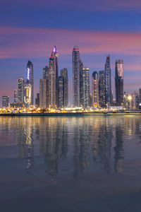 Amazing dubai marina and famous jumeirah beach at sunset, united arab emirates