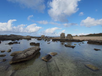 Panoramic view of rocks against sky