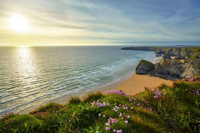 Scenic view of sea against sky during sunset