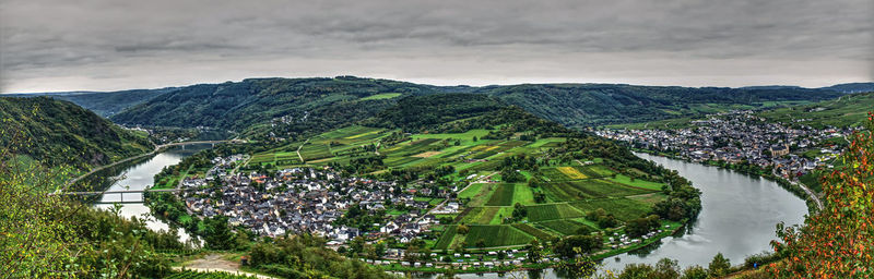 High angle view of trees and buildings against sky