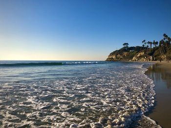 Scenic view of sea against clear sky