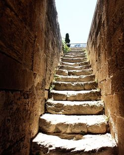 Low angle view of steps against sky