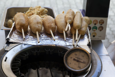 High angle view of food and gauge on stove at market