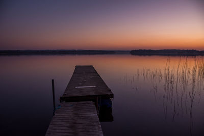 Jetty at skanderborg lake at sunrise, denmark