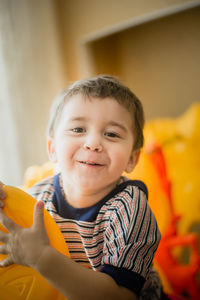 Portrait of cute boy smiling