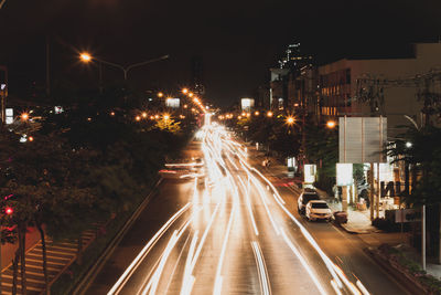 Light trails on city street at night