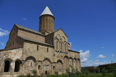 Low angle view of old building against sky